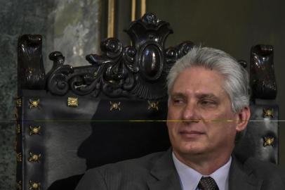 May 5, 2017 Cuban First Vice President Miguel Diaz-Canel listens to the speech by Ecuador's President Rafael Correa (out of frame) after he received the Honoris Causa Degree at the Aula Magna of Havana University, Havana