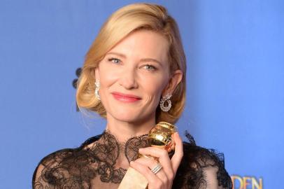 461491239Actress Cate Blanchett celebrates winning Best Actress in a Motion Picture - Drama for Blue Jasmine in the press room during the 71st Annual Golden Globe Awards in Beverly Hills, California, January 12, 2014.   AFP PHOTO / Robyn BECKEditoria: ACELocal: Beverly HillsIndexador: ROBYN BECKSecao: CinemaFonte: AFPFotógrafo: STF