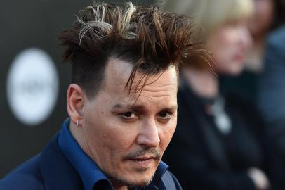 Actor Johnny Depp attends the premiere of Disneys Alice Through The Looking Glass, May 23, 2106 at the El Capitan Theatre in Hollywood, California. Robyn BECK / AFP