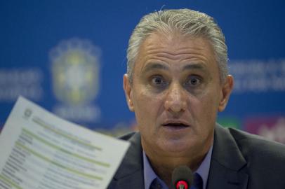  Brazilian football team head coach Tite, attends a press conference to announce the list of players for the upcoming friendly matches against Russia and Germany in preparation ahead of Russia 2018 World Cup, at the CBF (Brazilian Football Confederation) headquarters in Rio de Janeiro, Brazil on March 12, 2018.  / AFP PHOTO / Mauro PimentelEditoria: SPOLocal: Rio de JaneiroIndexador: MAURO PIMENTELSecao: soccerFonte: AFPFotógrafo: STF