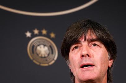  Germanys coach Joachim Low attends a press conference on the eve of the friendly football match Germany vs Brazil in Berlin, Germany, on March 26, 2018, in preparation of the 2018 Fifa World Cup. / AFP PHOTO / dpa / Christian Charisius / Germany OUTEditoria: SPOLocal: BerlinIndexador: CHRISTIAN CHARISIUSSecao: soccerFonte: dpaFotógrafo: STR