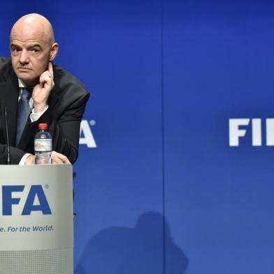 International Federation of Association Football (FIFA) President Gianni Infantino gives a press briefing closing a meeting of the FIFA executive council on January 10, 2017 at FIFA headquarters in Zurich.FIFA's ruling council on January 10 unanimously approved an expansion of the World Cup from 32 to 48 teams in 2026. / AFP PHOTO / Michael BUHOLZER