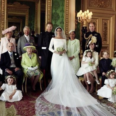 A picture released by Kensington Palace on behalf of The Duke and Duchess of Sussex on May 21, 2018 shows Britains Prince Harry, Duke of Sussex, (CL) and his wife Meghan, Duchess of Sussex, (CR) posing for an official wedding photograph with (L-R back row) Britains Camilla, Duchess of Cornwall, Britains Prince Charles, Prince of Wales, Doria Ragland, the Duchess of Sussexs mother, Britains Prince William, Duke of Cambridge, (middle row L-R): Master Jasper Dyer, Britains Prince Philip, Duke of Edinburgh, Britains Queen Elizabeth II, Britains Catherine, Duchess of Cambridge, Princess Charlotte of Cambridge, Prince George of Cambridge, Miss Rylan Litt, Master John Mulroney and (front row) Miss Ivy Mulroney, Master Brian Mulroney, Miss Florence van Cutsem, Miss Zalie Warren and Miss Remi Litt in the Green Drawing Room, Windsor Castle, in Windsor on May 19, 2018.  / AFP PHOTO / KENSINGTON PALACE /  / RESTRICTED TO EDITORIAL USE - MANDATORY CREDIT AFP PHOTO / THE DUKE AND DUCHESS OF SUSSEX / ALEXI LUBOMIRSKI  - NO MARKETING NO ADVERTISING CAMPAIGNS - NO COMMERCIAL USE - NO SALES - RESTRICTED TO SUBSCRIPTION USE - NO USE IN SOUVENIRS OR MEMORABILIA - NO CROPPING, ENHANCING OR DIGITAL MODIFICATION - NOT TO BE USED AFTER DECEMBER 31, 2018 - DISTRIBUTED AS A SERVICE TO CLIENTS / The erroneous mention[s] appearing in the metadata of this photo by Alexi Lubomirski has been modified in AFP systems in the following manner: [A picture released by Kensington Palace on behalf of The Duke and Duchess of Sussex on May 21, 2018 shows Britains Prince Harry, Duke of Sussex, (CL) and his wife Meghan, Duchess of Sussex, (CR) posing for an official wedding photograph with (L-R back row) Britains Camilla, Duchess of Cornwall, Britains Prince Charles, Prince of Wales, Doria Ragland, the Duchess of Sussexs mother, Britains Prince William, Duke of Cambridge, (middle row L-R): Master Jasper Dyer, Britains Prince Philip, Duke of Edinburgh, Britains Queen Elizab