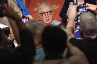 (FILES) In this file photo taken on May 11, 2016 US director Woody Allen attends a press conference for the film Cafe Society ahead of the opening of the 69th Cannes Film Festival in Cannes, southern France.Moses Farrow, the adopted son of Mia Farrow and Woody Allen, released a lengthy personal essay May 23, 2018, disputing allegations that his father molested his sister and accusing his mother of abuse. Film director Allen has faced widening isolation over allegations that he molested his adopted daughter Dylan Farrow as a seven-year-old in 1992, leading a string of actors to distance themselves from him. / AFP PHOTO / LOIC VENANCE