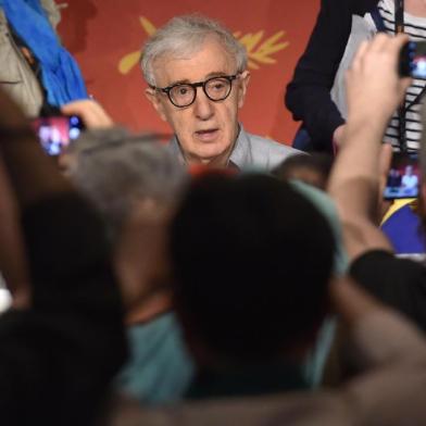 (FILES) In this file photo taken on May 11, 2016 US director Woody Allen attends a press conference for the film Cafe Society ahead of the opening of the 69th Cannes Film Festival in Cannes, southern France.Moses Farrow, the adopted son of Mia Farrow and Woody Allen, released a lengthy personal essay May 23, 2018, disputing allegations that his father molested his sister and accusing his mother of abuse. Film director Allen has faced widening isolation over allegations that he molested his adopted daughter Dylan Farrow as a seven-year-old in 1992, leading a string of actors to distance themselves from him. / AFP PHOTO / LOIC VENANCE