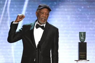 (FILES) In this file photo taken on January 21, 2018 Morgan Freeman accepts the Life Achievement Award onstage during the 24th Annual Screen Actors Guild Awards show at The Shrine Auditorium in Los Angeles, California.Multiple women are accusing Morgan Freeman of sexual misconduct, CNN reported on May 24, 2018. Sixteen people -- eight of whom say they were victims -- described a variety of troubling behavior on production sets or on promotional tours over Morgans career.The cable network quoted a young production assistant who says Morgan harassed her over a period of months in the summer of 2015, while she was working on his bank heist comedy Going in Style. / AFP PHOTO / 