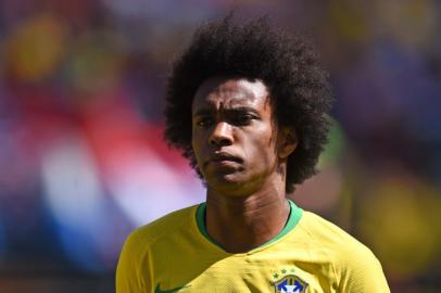 Brazil's midfielder Willian lines up for the anthems ahead of the International friendly football match between Brazil and Croatia at Anfield in Liverpool on June 3, 2018.  Oli SCARFF / AFP