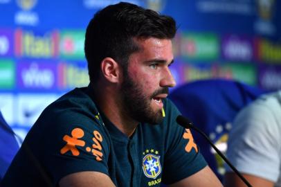 Brazil's goalkeeper Alisson attends a press conference at Yug Sport Stadium in Sochi on June 12, 2018, ahead of the Russia 2018 World Cup football tournament.  