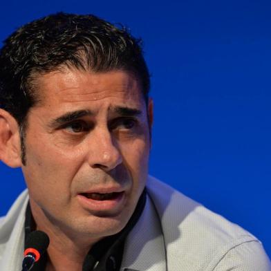 Spanish Football legend Fernando Hierro gives a press conference on the eve of the Brazil 2014 FIFA Football World Cup final draw, in Costa do Sauipe, state of Bahia, on December 5, 2013. Hierro is amongst the eight players taking part in the draw ceremony that will determine the eight groups of the World Cup final stage.  AFP PHOTO / NELSON ALMEIDA