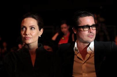   This file photo taken on June 13, 2014 shows US actress and special UN envoy Angelina Jolie (L) and her husband US actor Brad Pitt attending the fourth day of the Global Summit to End Sexual Violence in Conflict in London. US actress Angelina Jolie has filed for divorce from her husband Brad Pitt after two years of marriage and 12 years together, announced on September 20, 2016 by the website TMZ celebrity.Carl COURT / AFPEditoria: CLJLocal: LondonIndexador: CARL COURTSecao: war crimeFonte: AFPFotógrafo: STR