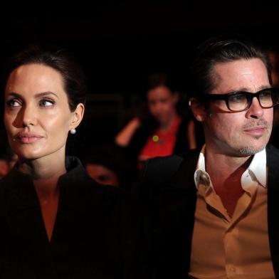   This file photo taken on June 13, 2014 shows US actress and special UN envoy Angelina Jolie (L) and her husband US actor Brad Pitt attending the fourth day of the Global Summit to End Sexual Violence in Conflict in London. US actress Angelina Jolie has filed for divorce from her husband Brad Pitt after two years of marriage and 12 years together, announced on September 20, 2016 by the website TMZ celebrity.Carl COURT / AFPEditoria: CLJLocal: LondonIndexador: CARL COURTSecao: war crimeFonte: AFPFotógrafo: STR