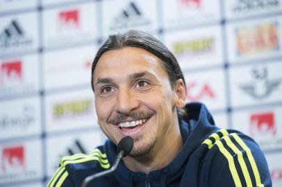 (FILES) This file photo taken on June 1, 2016 shows then Swedens forward and team captain Zlatan Ibrahimovic attending a press conference in Bastad, Sweden, as part of preparations for the upcoming Euro 2016 European football championships.After Swedens Miracle of Milan booked them a berth at the World Cup finals and sent Italy crashing out on November 14, 2017, could Zlatan Ibrahimovic be set for a return from international retirement? In the minutes after the Swedes hung on for a goalless draw on Monday that secured one of the big World Cup upsets, Ibrahimovic wrote We are Zweden on Instagram next to a photo of the delighted team, deliberately adding the Z of his name to his countrys. / AFP PHOTO / JONATHAN NACKSTRAND