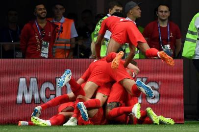  England players celebrate their second goal during the Russia 2018 World Cup Group G football match between Tunisia and England at the Volgograd Arena in Volgograd on June 18, 2018. / AFP PHOTO / Mark RALSTON / RESTRICTED TO EDITORIAL USE - NO MOBILE PUSH ALERTS/DOWNLOADSEditoria: SPOLocal: VolgogradIndexador: MARK RALSTONSecao: soccerFonte: AFPFotógrafo: STF