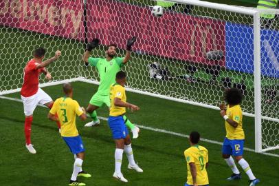  Switzerlands midfielder Steven Zuber (L) scores against Brazils goalkeeper Alisson during the Russia 2018 World Cup Group E football match between Brazil and Switzerland at the Rostov Arena in Rostov-On-Don on June 17, 2018. / AFP PHOTO / KHALED DESOUKI / RESTRICTED TO EDITORIAL USE - NO MOBILE PUSH ALERTS/DOWNLOADSEditoria: SPOLocal: Rostov-on-DonIndexador: KHALED DESOUKISecao: soccerFonte: AFPFotógrafo: STF