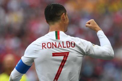  Portugals forward Cristiano Ronaldo celebrates his opening goal during the Russia 2018 World Cup Group B football match between Portugal and Morocco at the Luzhniki Stadium in Moscow on June 20, 2018. / AFP PHOTO / Francisco LEONG / RESTRICTED TO EDITORIAL USE - NO MOBILE PUSH ALERTS/DOWNLOADSEditoria: SPOLocal: MoscowIndexador: FRANCISCO LEONGSecao: soccerFonte: AFPFotógrafo: STF