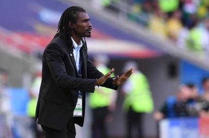 Senegal's coach Aliou Cisse gestures during the Russia 2018 World Cup Group H football match between Poland and Senegal at the Spartak Stadium in Moscow on June 19, 2018. / AFP PHOTO / Francisco LEONG / RESTRICTED TO EDITORIAL USE - NO MOBILE PUSH ALERTS/DOWNLOADS