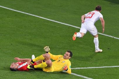  Switzerlands forward Xherdan Shaqiri (R) reacts as he scores his teams second goal  during the Russia 2018 World Cup Group E football match between Serbia and Switzerland at the Kaliningrad Stadium in Kaliningrad on June 22, 2018. / AFP PHOTO / Patrick HERTZOG / RESTRICTED TO EDITORIAL USE - NO MOBILE PUSH ALERTS/DOWNLOADSEditoria: SPOLocal: KaliningradIndexador: PATRICK HERTZOGSecao: soccerFonte: AFPFotógrafo: STF