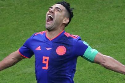  Colombias forward Falcao celebrates after scoring their second goal during the Russia 2018 World Cup Group H football match between Poland and Colombia at the Kazan Arena in Kazan on June 24, 2018. / AFP PHOTO / Roman Kruchinin / RESTRICTED TO EDITORIAL USE - NO MOBILE PUSH ALERTS/DOWNLOADSEditoria: SPOLocal: KazanIndexador: ROMAN KRUCHININSecao: soccerFonte: AFPFotógrafo: STR