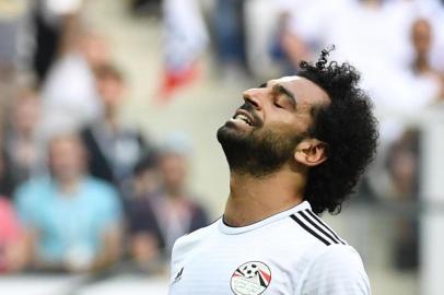  Egypts forward Mohamed Salah celebrates scoring during the Russia 2018 World Cup Group A football match between Saudi Arabia and Egypt at the Volgograd Arena in Volgograd on June 25, 2018. / AFP PHOTO / Philippe DESMAZES / RESTRICTED TO EDITORIAL USE - NO MOBILE PUSH ALERTS/DOWNLOADSEditoria: SPOLocal: VolgogradIndexador: PHILIPPE DESMAZESSecao: soccerFonte: AFPFotógrafo: STF