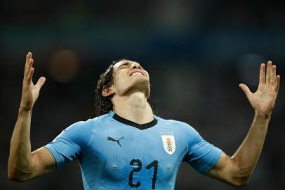 Uruguays forward Edinson Cavani celebrates after giving his team the lead with his second goal during the Russia 2018 World Cup round of 16 football match between Uruguay and Portugal at the Fisht Stadium in Sochi on June 30, 2018. / AFP PHOTO / Odd ANDERSEN / RESTRICTED TO EDITORIAL USE - NO MOBILE PUSH ALERTS/DOWNLOADS