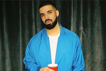 Drake interrompe show para xingar homem que agredia mulher