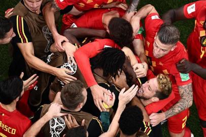  Belgium's players celebrate their second goal during the Russia 2018 World Cup round of 16 football match between Belgium and Japan at the Rostov Arena in Rostov-On-Don on July 2, 2018. / AFP PHOTO / Jewel SAMAD / RESTRICTED TO EDITORIAL USE - NO MOBILE PUSH ALERTS/DOWNLOADSEditoria: SPOLocal: Rostov-on-DonIndexador: JEWEL SAMADSecao: soccerFonte: AFPFotógrafo: STF