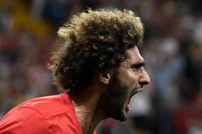  Belgiums midfielder Marouane Fellaini celebrates after scoring the equaliser during the Russia 2018 World Cup round of 16 football match between Belgium and Japan at the Rostov Arena in Rostov-On-Don on July 2, 2018. / AFP PHOTO / Filippo MONTEFORTE / RESTRICTED TO EDITORIAL USE - NO MOBILE PUSH ALERTS/DOWNLOADSEditoria: SPOLocal: Rostov-on-DonIndexador: FILIPPO MONTEFORTESecao: soccerFonte: AFPFotógrafo: STF