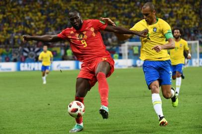 Brazil's defender Miranda (R) marks Belgium's forward Romelu Lukaku during the Russia 2018 World Cup quarter-final football match between Brazil and Belgium at the Kazan Arena in Kazan on July 6, 2018.  Jewel SAMAD / AFP