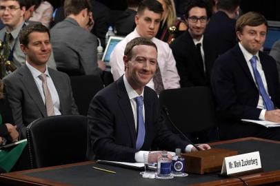 Facebook CEO Mark Zuckerberg Testifies At Joint Senate Commerce/Judiciary HearingWASHINGTON, DC - APRIL 10: Facebook co-founder, Chairman and CEO Mark Zuckerberg testifies before a combined Senate Judiciary and Commerce committee hearing in the Hart Senate Office Building on Capitol Hill April 10, 2018 in Washington, DC. Zuckerberg, 33, was called to testify after it was reported that 87 million Facebook users had their personal information harvested by Cambridge Analytica, a British political consulting firm linked to the Trump campaign.   Alex Wong/Getty Images/AFPEditoria: POLLocal: WashingtonIndexador: ALEX WONGSecao: GovernmentFonte: GETTY IMAGES NORTH AMERICAFotógrafo: STF