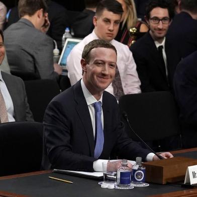 Facebook CEO Mark Zuckerberg Testifies At Joint Senate Commerce/Judiciary HearingWASHINGTON, DC - APRIL 10: Facebook co-founder, Chairman and CEO Mark Zuckerberg testifies before a combined Senate Judiciary and Commerce committee hearing in the Hart Senate Office Building on Capitol Hill April 10, 2018 in Washington, DC. Zuckerberg, 33, was called to testify after it was reported that 87 million Facebook users had their personal information harvested by Cambridge Analytica, a British political consulting firm linked to the Trump campaign.   Alex Wong/Getty Images/AFPEditoria: POLLocal: WashingtonIndexador: ALEX WONGSecao: GovernmentFonte: GETTY IMAGES NORTH AMERICAFotógrafo: STF