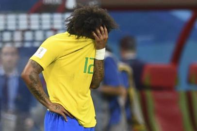  Brazils defender Marcelo reacts to their defeat at the end of the Russia 2018 World Cup quarter-final football match between Brazil and Belgium at the Kazan Arena in Kazan on July 6, 2018. / AFP PHOTO / Manan VATSYAYANA / RESTRICTED TO EDITORIAL USE - NO MOBILE PUSH ALERTS/DOWNLOADSEditoria: SPOLocal: KazanIndexador: MANAN VATSYAYANASecao: soccerFonte: AFPFotógrafo: STF