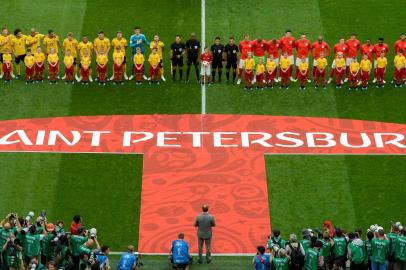 Belgium and Englands starting eleven sing their respective national anthems ahead of their Russia 2018 World Cup play-off for third place football match between Belgium and England at the Saint Petersburg Stadium in Saint Petersburg on July 14, 2018. / AFP PHOTO / Olga MALTSEVA / RESTRICTED TO EDITORIAL USE - NO MOBILE PUSH ALERTS/DOWNLOADS