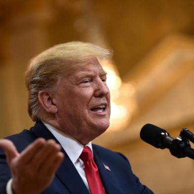  US President Donald Trump attends a joint press conference with the Russian President after a meeting at the Presidential Palace in Helsinki, on July 16, 2018.The US and Russian leaders opened an historic summit in Helsinki, with Donald Trump promising an "extraordinary relationship" and Vladimir Putin saying it was high time to thrash out disputes around the world. / AFP PHOTO / Brendan SMIALOWSKIEditoria: POLLocal: HelsinkiIndexador: BRENDAN SMIALOWSKISecao: diplomacyFonte: AFPFotógrafo: STF