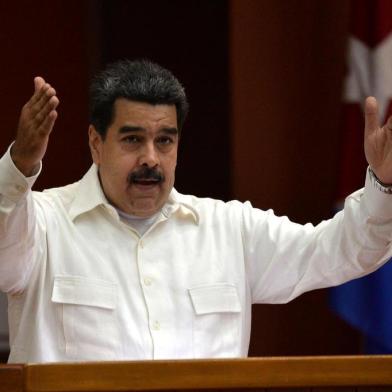  Venezuelan President Nicolas Maduro delivers a speech during the XXIV Forum of Sao Paulo meeting in Havana on July 17, 2018.  / AFP PHOTO / YAMIL LAGEEditoria: POLLocal: HavanaIndexador: YAMIL LAGESecao: politics (general)Fonte: AFPFotógrafo: STF