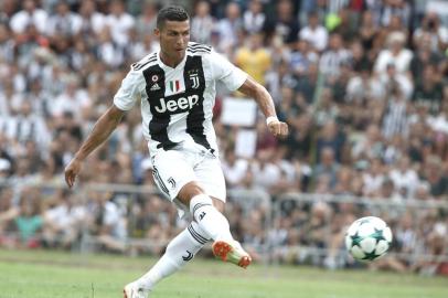 Juventus' forward from Portugal Cristiano Ronaldo scores a goal during the friendly football match between Juventus A and Juventus B at Villar Perosa, on August 12, 2018 at Villar Perosa. / AFP PHOTO / Isabella Bonotto