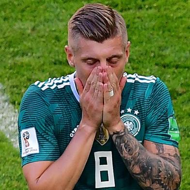 Germanys midfielder Toni Kroos reacts during the Russia 2018 World Cup Group F football match between South Korea and Germany at the Kazan Arena in Kazan on June 27, 2018. / AFP PHOTO / Luis Acosta / RESTRICTED TO EDITORIAL USE - NO MOBILE PUSH ALERTS/DOWNLOADS