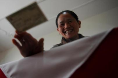  CAXIAS DO SUL, RS, BRASIL, 14/09/2018Hsueh Yu Tseng, a Lúcia, é de Taiwan e se naturalizou brasileira. Vai votar na eleição deste ano pela primeira vez. (Lucas Amorelli/Agência RBS)