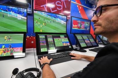 A view of the video assistant refereeing (VAR) operation room at the 2018 FIFA World Cup Russia International Broadcast Centre (IBC) in Moscow on June 9, 2018. / AFP PHOTO / Mladen ANTONOV