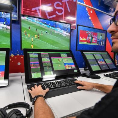 A view of the video assistant refereeing (VAR) operation room at the 2018 FIFA World Cup Russia International Broadcast Centre (IBC) in Moscow on June 9, 2018. / AFP PHOTO / Mladen ANTONOV