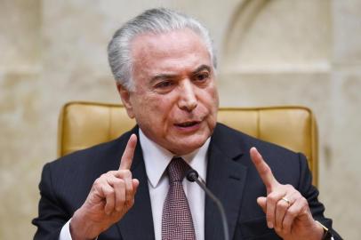  Brazilian President Michel Temer delivers a speech during a solemn session to mark the 30th anniversary of the 1988 Brazilian Constitution at the Supreme Court plenary, in Brasilia on October 4, 2018. / AFP PHOTO / EVARISTO SAEditoria: POLLocal: BrasíliaIndexador: EVARISTO SASecao: constitutionFonte: AFPFotógrafo: STF