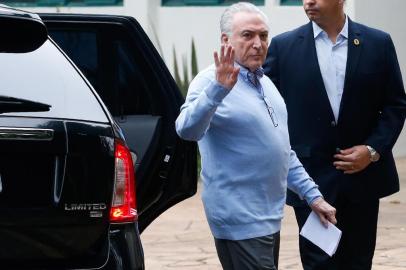  Brazils president Michel Temer waves upon arrival at a polling station, during general elections, in Sao Paulo, Brazil, on October 7, 2018.Brazilians began casting ballots Sunday in their most divisive presidential election in years, with a far-right politician promising an iron-fisted crackdown on crime, Jair Bolsonaro, the firm favorite in the first round. / AFP PHOTO / Alexandre SchneiderEditoria: POLLocal: Sao PauloIndexador: ALEXANDRE SCHNEIDERSecao: electionFonte: AFPFotógrafo: STR