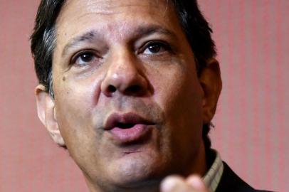 Brazil's presidential candidate for the Workers' Party (PT), Fernando Haddad, speaks during a press conference after a meeting at the Brazilian National Conference of Bishops, in Brasilia on October 11, 2018. (Photo by EVARISTO SA / AFP)