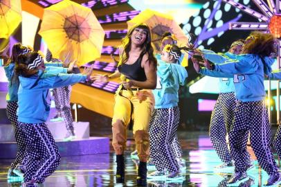 HOLLYWOOD, CA - OCTOBER 25: Anitta (C) performs onstage during the 2018 Latin American Music Awards at Dolby Theatre on October 25, 2018 in Hollywood, California.   Rich Fury/Getty Images/AFP