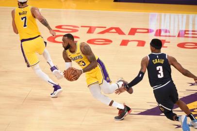 LOS ANGELES, CA - OCTOBER 25: LeBron James #23 of the Los Angeles Lakers against the Denver Nuggets on October 25, 2018 at Staples Center in Los Angeles, California. NOTE TO USER: User expressly acknowledges and agrees that, by downloading and/or using this photograph, User is consenting to the terms and conditions of the Getty Images License Agreement. Mandatory Copyright Notice: Copyright 2018 NBAE   Adam Pantozzi/NBAE via Getty Images/AFP