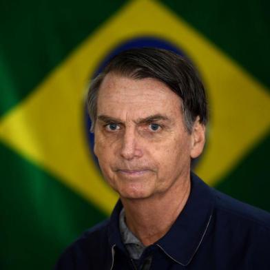  O candidato à Presidência da República pelo PSL, Jair Bolsonaro, vota no primeiro turno das Eleições 2018 na Vila Militar, em Marechal Hermes, na zona norte da cidade, neste domingo, 7.Brazils right-wing presidential candidate for the Social Liberal Party (PSL) Jair Bolsonaro walks in front of the Brazilian flag as he prepares to cast his vote during the general elections, in Rio de Janeiro, Brazil, on October 7, 2018.Polling stations opened in Brazil on Sunday for the most divisive presidential election in the country in years, with far-right lawmaker Jair Bolsonaro the clear favorite in the first round. About 147 million voters are eligible to cast ballots and choose who will rule the worlds eighth biggest economy. New federal and state legislatures will also be elected. / AFP PHOTO / Mauro PIMENTELEditoria: POLLocal: Rio de JaneiroIndexador: MAURO PIMENTELSecao: electionFonte: AFPFotógrafo: STF