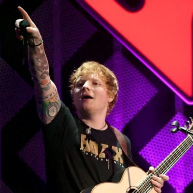 INGLEWOOD, CA - DECEMBER 01: Ed Sheeran performs onstage during 102.7 KIIS FMs Jingle Ball 2017 presented by Capital One at The Forum on December 1, 2017 in Inglewood, California.   Kevin Winter/Getty Images for iHeartMedia/AFP Ed Sheeran performs at the Z100s iHeartRadio Jingle Ball 2017 at Madison Square Garden on December 7, 2017 in New York. (Photo by ANGELA WEISS / AFP)