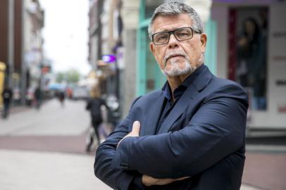 This photo taken on November 5, 2018 shows s portrait of a 69 year old Dutchman Emile Ratelband in the centre of Arnhem, The Netherlands. - Emile Ratelband wants his official age (69) to be adjusted with his emotional age (49). (Photo by Roland Heitink / ANP / AFP) / Netherlands OUT