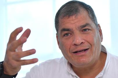 Ecuadoran former President (2007-2017) Rafael Correa gestures during an interview with Agence France-Presse (AFP) in Ottignies-Louvain-la Neuve, on November 8, 2018. - An Ecuador court is set to decide on November 8, 2018 whether former President Rafael Correa will be tried for the kidnapping of an opponent in 2012. (Photo by Emmanuel DUNAND / AFP)