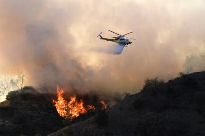 Flames from a wildfire burn a portion of Griffith Park in Los Angeles, California, November 9, 2018. Staff at the Los Angeles Zoo, which is located in the park are preparing animals to be evacuated.