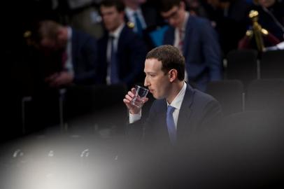 Facebook chief Zuckerberg testifies to lawmakers after data hijacking scandalFacebook CEO Mark Zuckerberg waits for a joint hearing of the Senate Commerce, Science and Transportation Committee and Senate Judiciary Committee on Capitol Hill April 10, 2018 in Washington, DC.Zuckerberg, making his first formal appearance at a Congressional hearing, seeks to allay widespread fears ignited by the leaking of private data on tens of millions of users to British firm Cambridge Analytica working on Donald Trumps 2016 presidential campaign. / AFP PHOTO / Brendan SmialowskiEditoria: FINLocal: WashingtonIndexador: BRENDAN SMIALOWSKISecao: electionFonte: AFPFotógrafo: STF